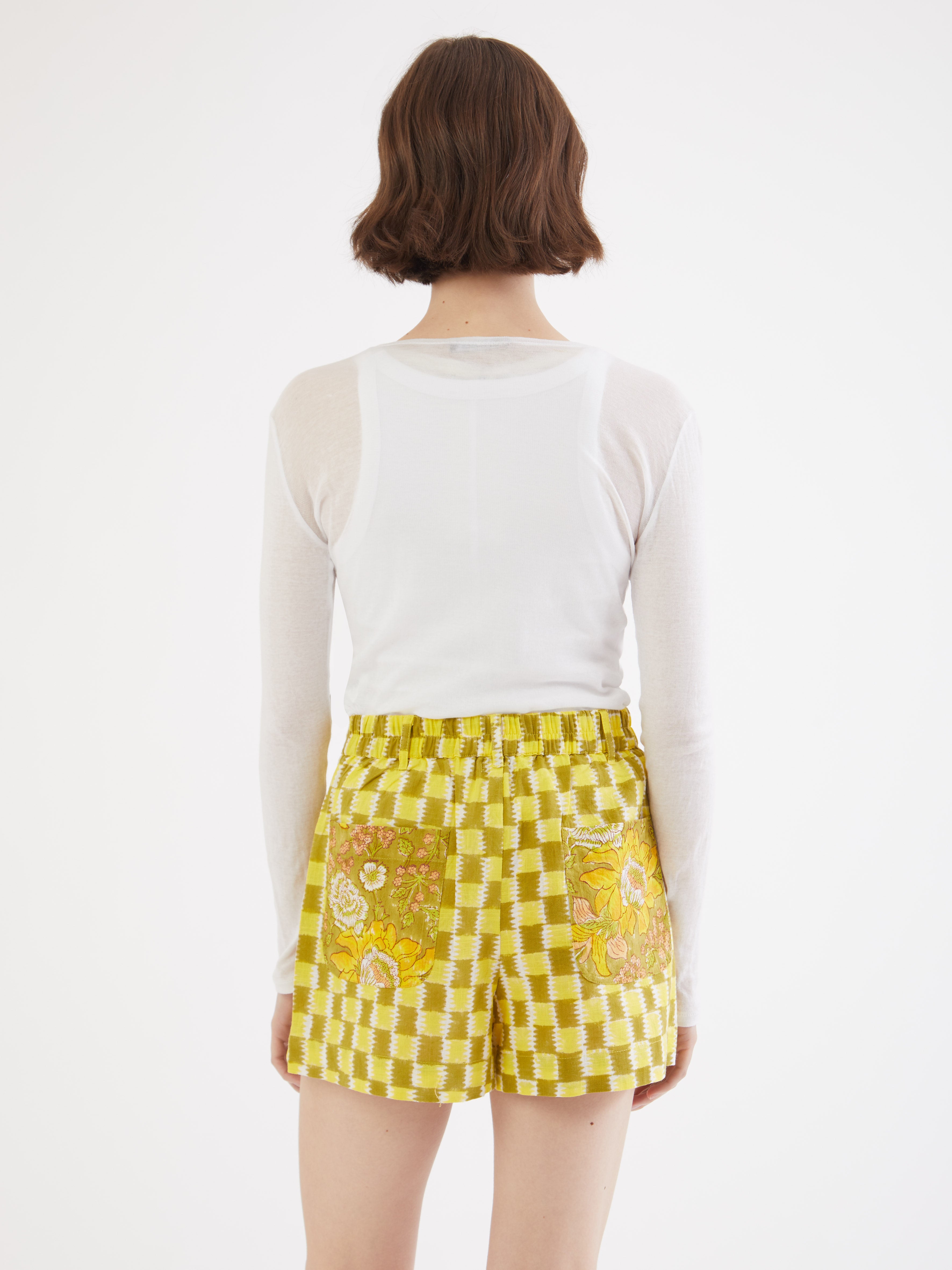 Cotton Shorts, Co-ord Set, India Crafted, Embroidered Details, Relaxed Fit, Wide-Leg Design, Elastic Waistband, Stylish Shorts, Casual Outing, Mix and Match, Coordinated Look, Green Shorts, Adjustable Waist, Side Pockets, Machine Washable, High-Quality Fabric, Comfortable Wear, Fashionable Style, Versatile Clothing, Unique Design, Handcrafted Details, Sustainable Fashion, Easy Care, Trendy Shorts, Stylish Embellishments, Chic Apparel, Fashion