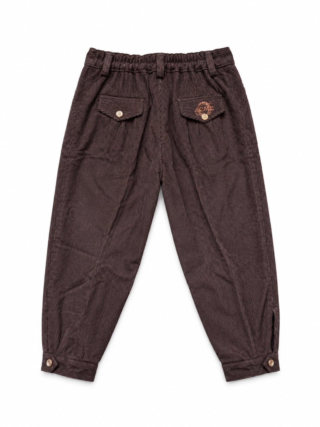 Dark brown corduroy pants with an elastic waistband, flap pockets with snap buttons, and cuffed ankles, shown flat on a white background. Argentine Bombacha Pants, horseback riding, traditional gaucho, Argentine cowboy attire. Soft and breathable fabrics, perfect pants for all-day wear. With a loose fit and elasticated waistband, they allow for plenty of movement, while the high waist provides extra coverage. Everyday look, perfect for both urban and countryside adventures. Cotton Corduroy, KIDS, PANTS, KID
